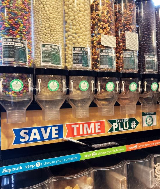 Bulk food dispensers with assorted snacks and ingredients